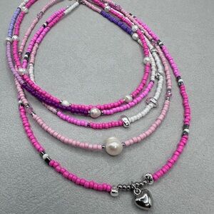 Elegant Multi-Strand Pink and Purple Beaded Necklace with Heart Charm